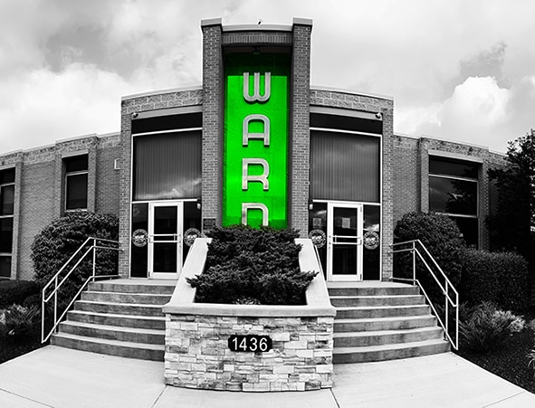 Iowa Freight Broker - General Office Building in B&W with green Ward background - Ward Logistics